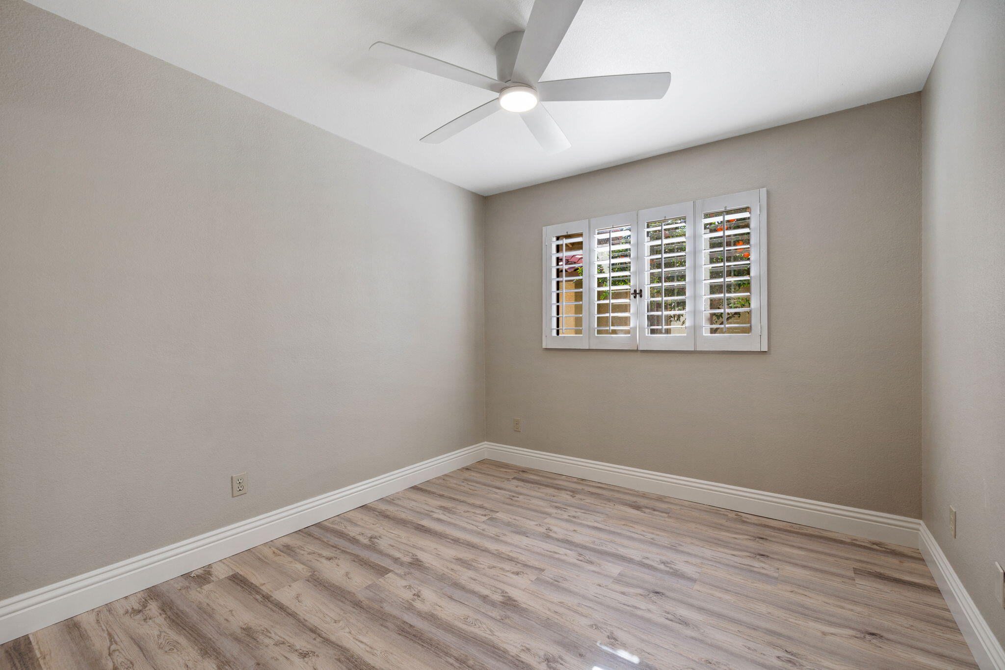 41045 Largo Palm Desert, CA 92211 - Photo 28 of 46 a view of an empty room with a window