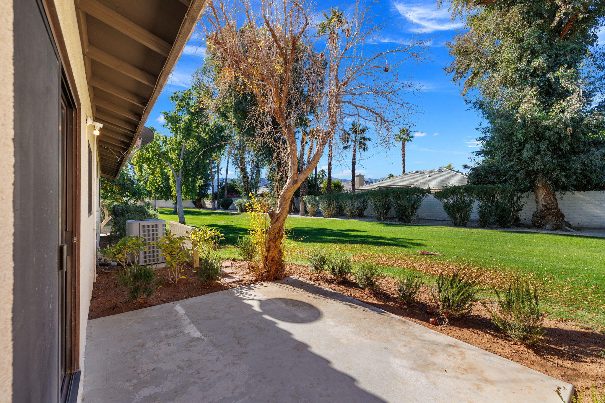 41045 Largo Palm Desert, CA 92211 - Photo 33 of 46 a view of a park with large trees