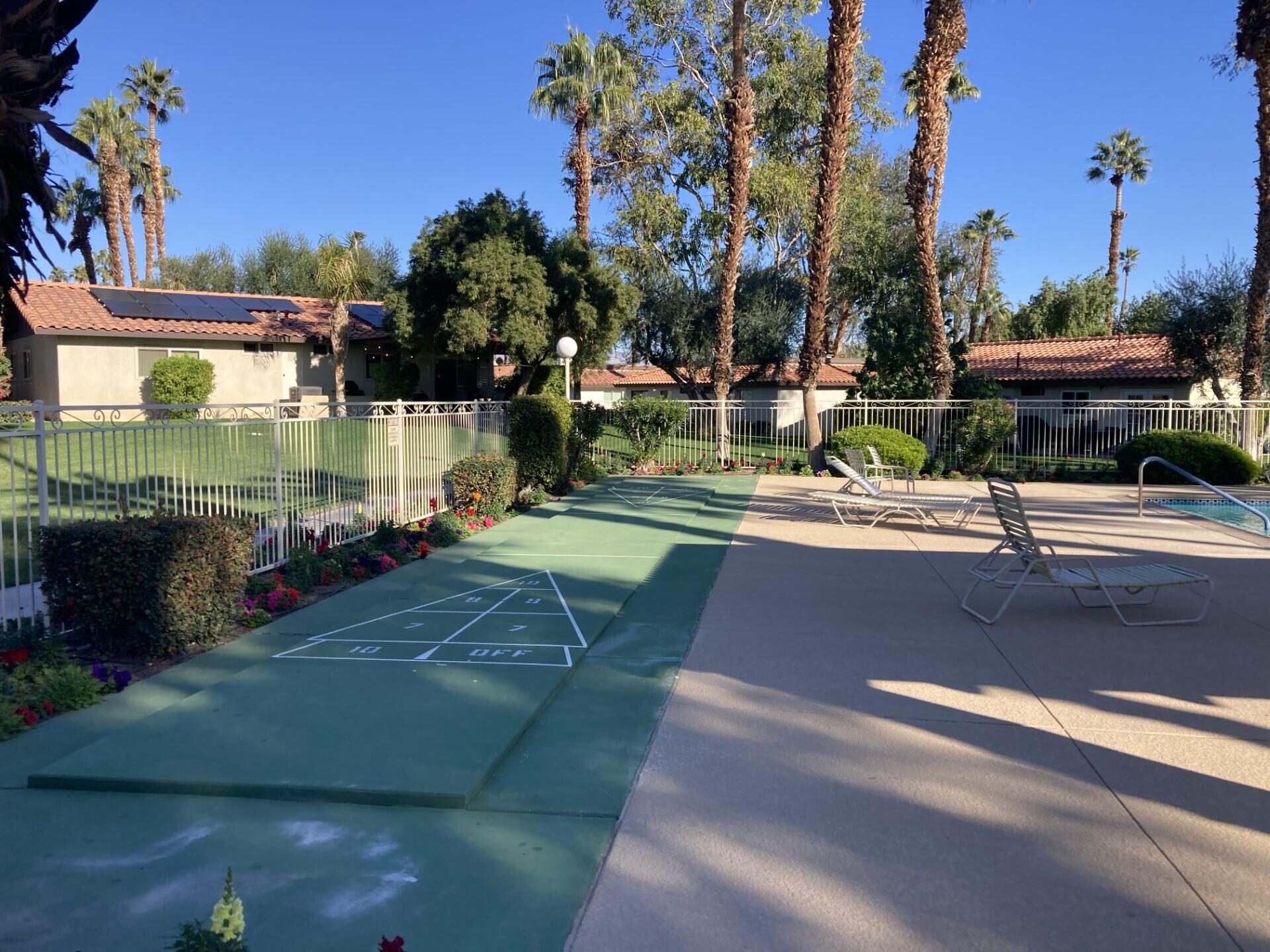 41045 Largo Palm Desert, CA 92211 - Photo 41 of 46 a view of a park with large trees
