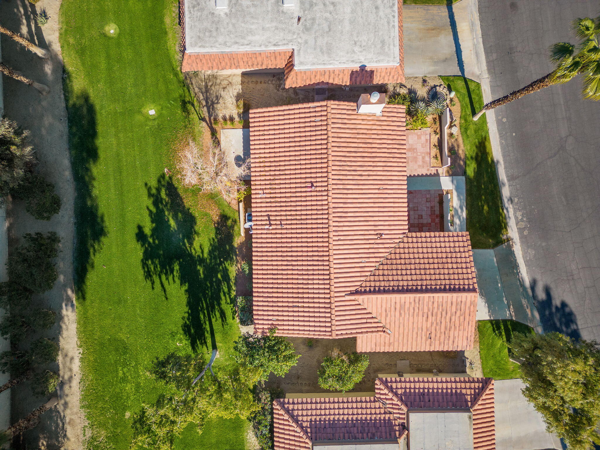 41045 Largo Palm Desert, CA 92211 - Photo 43 of 46 a view of a house with a yard