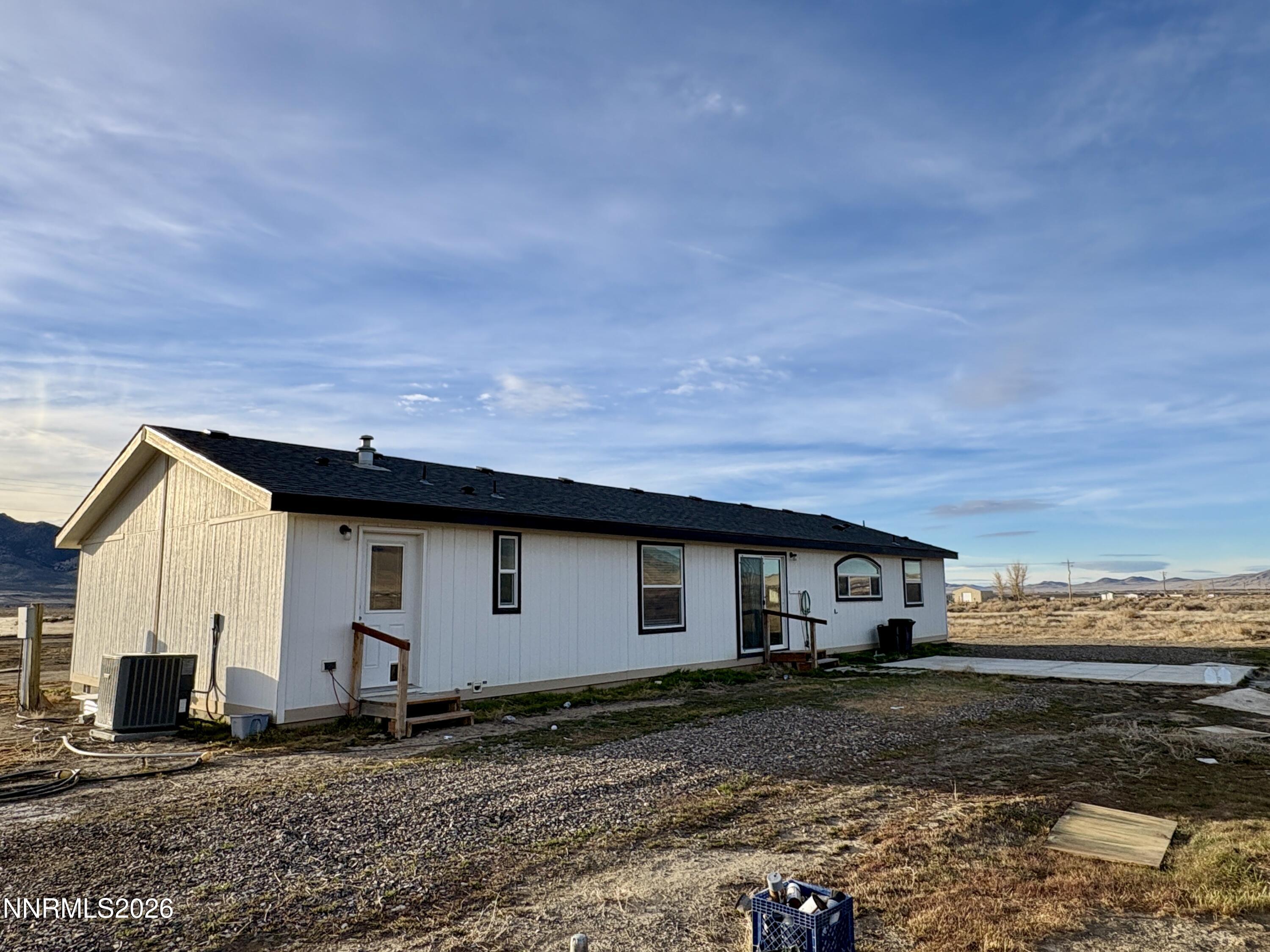 1415 Van Diest Road Winnemucca, NV 89445 - Photo 31 of 34 a house view with a backyard space