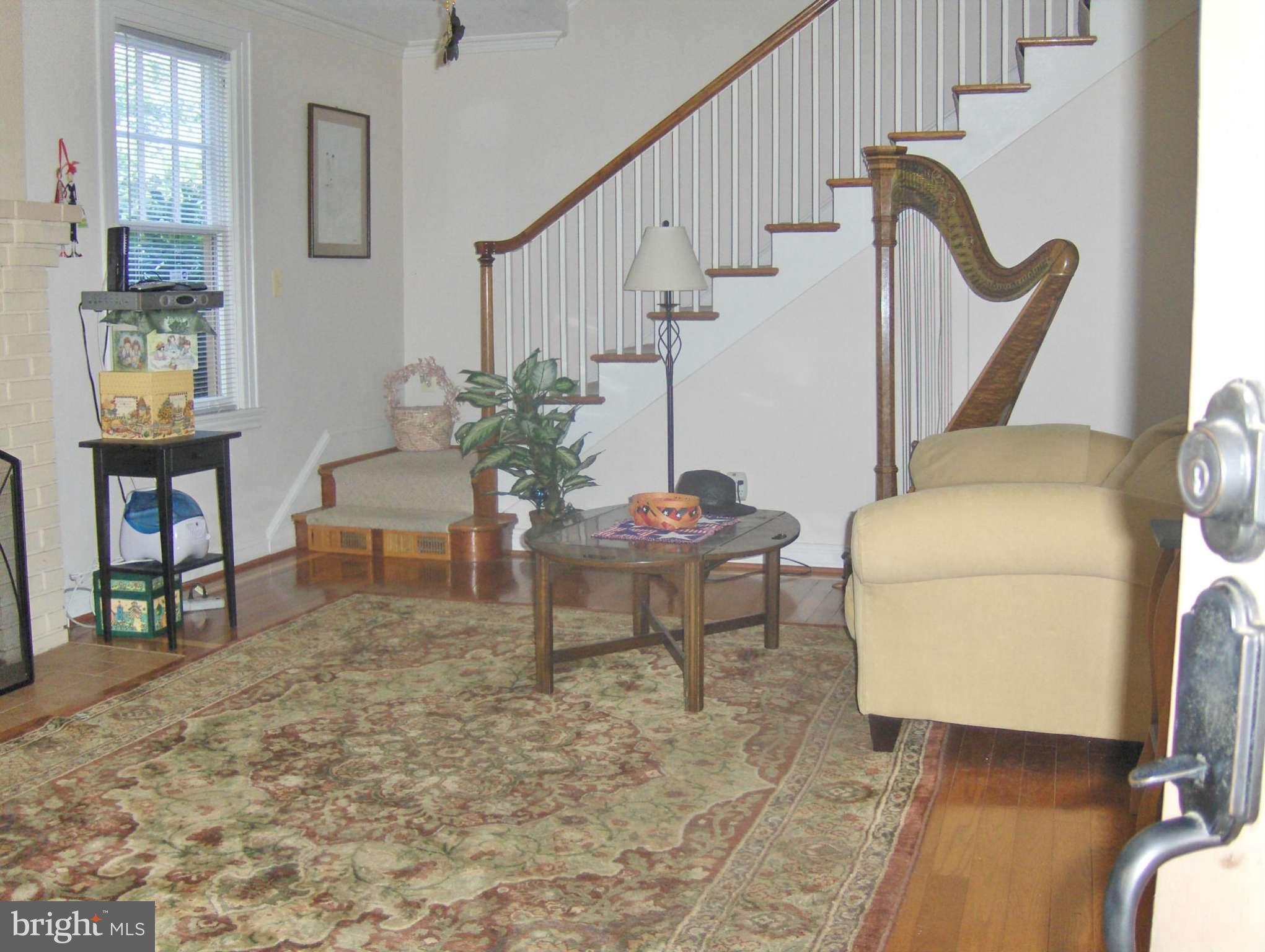 4957 Muddy Creek Road West River, MD 20778 - Photo 11 of 29 a living room with furniture and a dining table