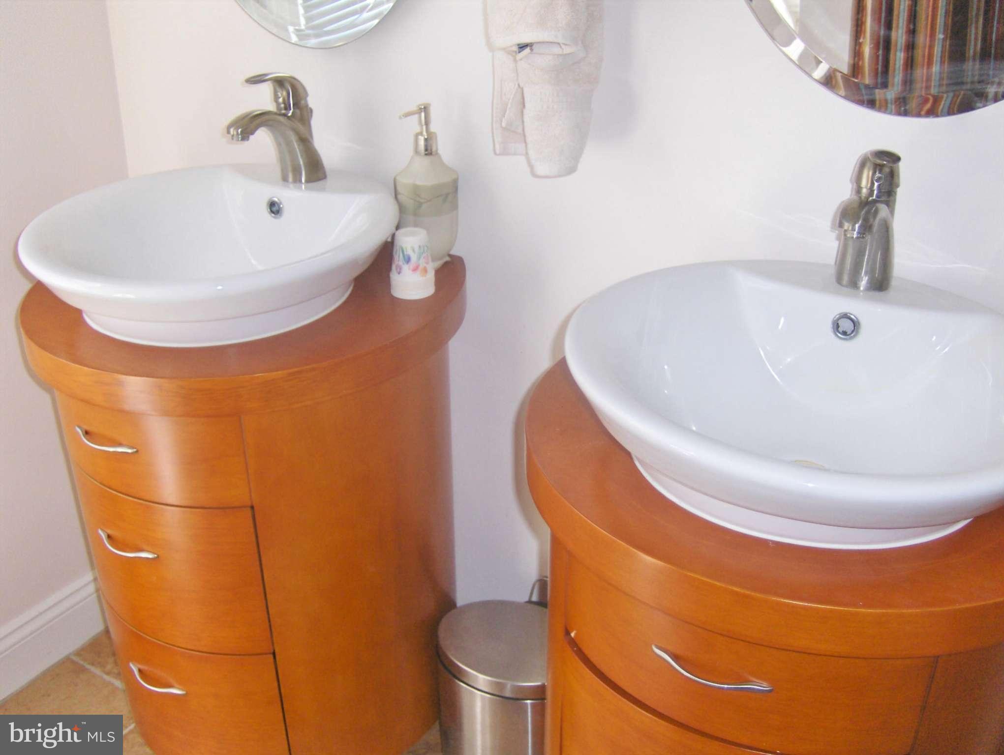 4957 Muddy Creek Road West River, MD 20778 - Photo 15 of 29 a bathroom with a sink and a toilet