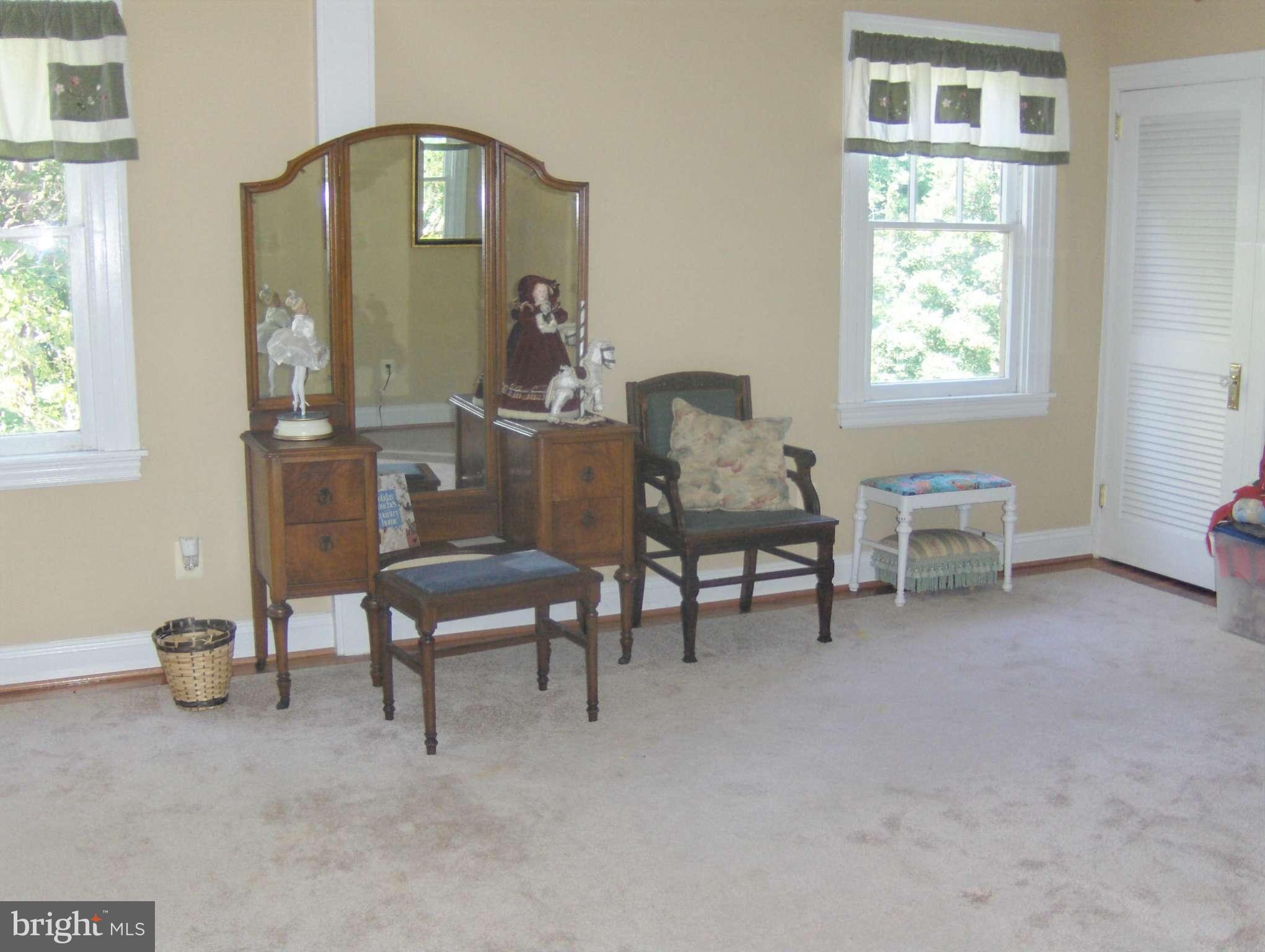 4957 Muddy Creek Road West River, MD 20778 - Photo 18 of 29 a living room with furniture and a window