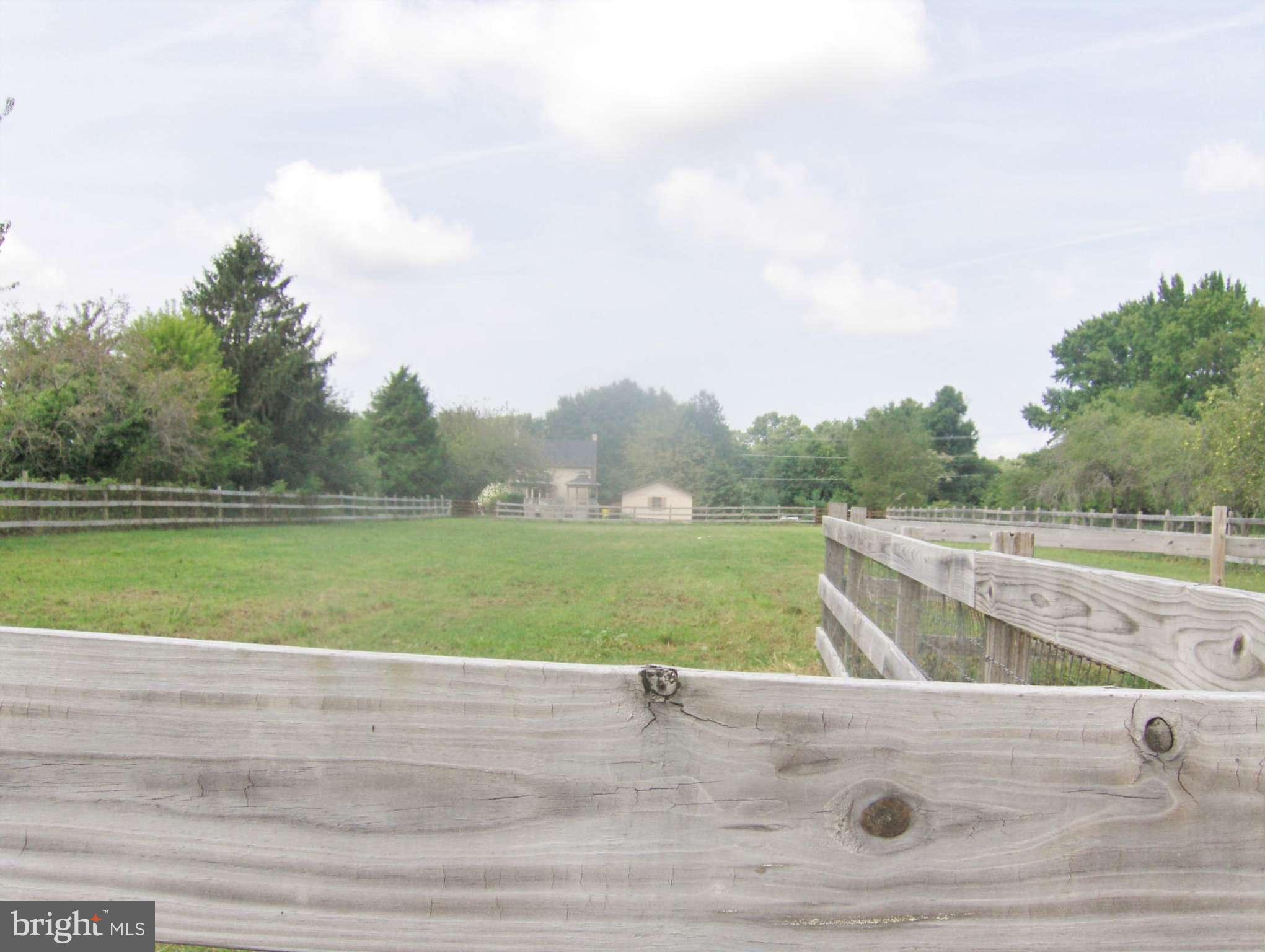 4957 Muddy Creek Road West River, MD 20778 - Photo 28 of 29 a view of a swimming pool with a yard