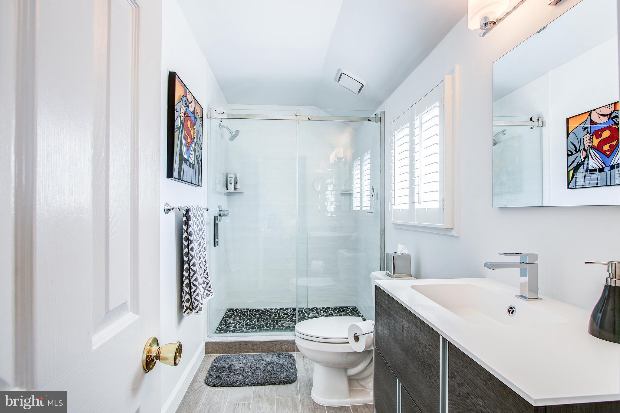 7013 Exfair Road Bethesda, MD 20814 - Photo 25 of 31 Jack and Jill Bath for bedrooms 3 and 4