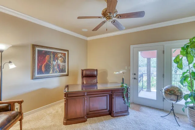 a workspace with furniture and window