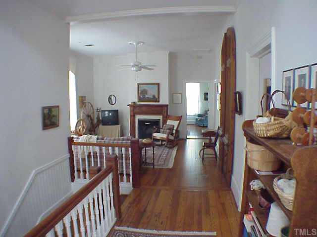 405 Polk Street Raleigh, NC 27604 - Photo 4 of 10 a living room with furniture and a wooden floor