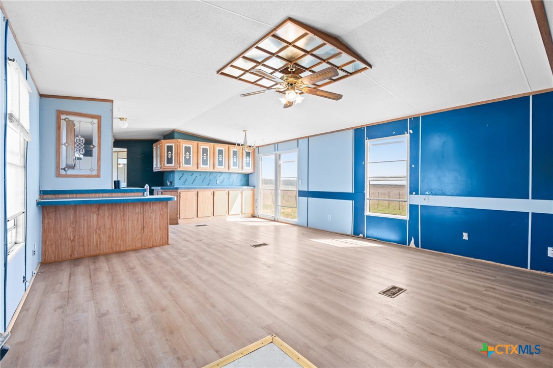 996 County Road 421 Evant, TX 76525 - Photo 22 of 48 a view of a kitchen with wooden floor