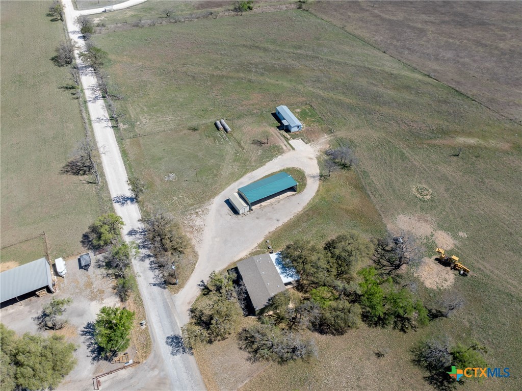 996 County Road 421 Evant, TX 76525 - Photo 42 of 48 an aerial view of a house with a yard