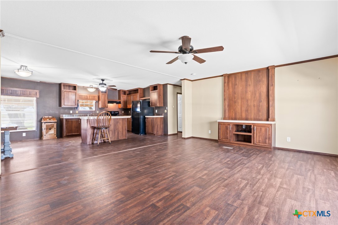 996 County Road 421 Evant, TX 76525 - Photo 5 of 48 a view of a livingroom with furniture wooden floor and window