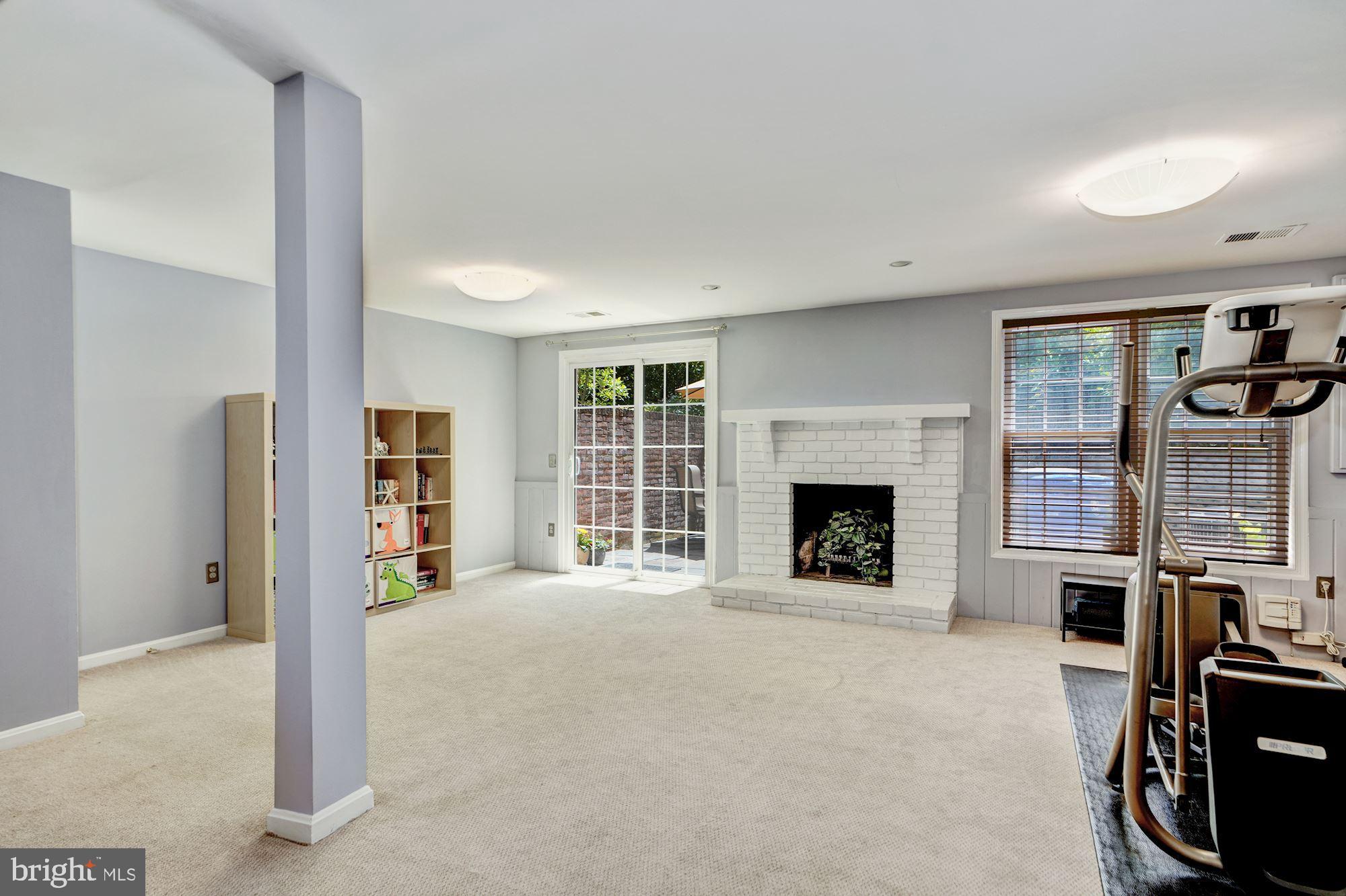 4519 4th Road North Arlington, VA 22203 - Photo 27 of 32 Wood burning fireplace and patio access