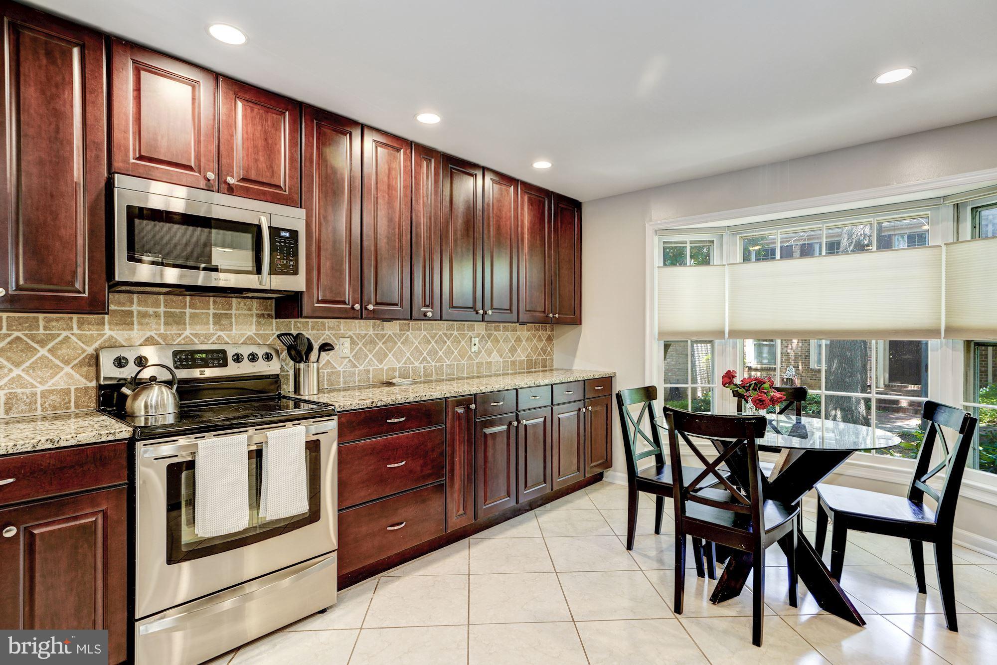 4519 4th Road North Arlington, VA 22203 - Photo 6 of 32 Charming backsplash, granite counters, cabinets