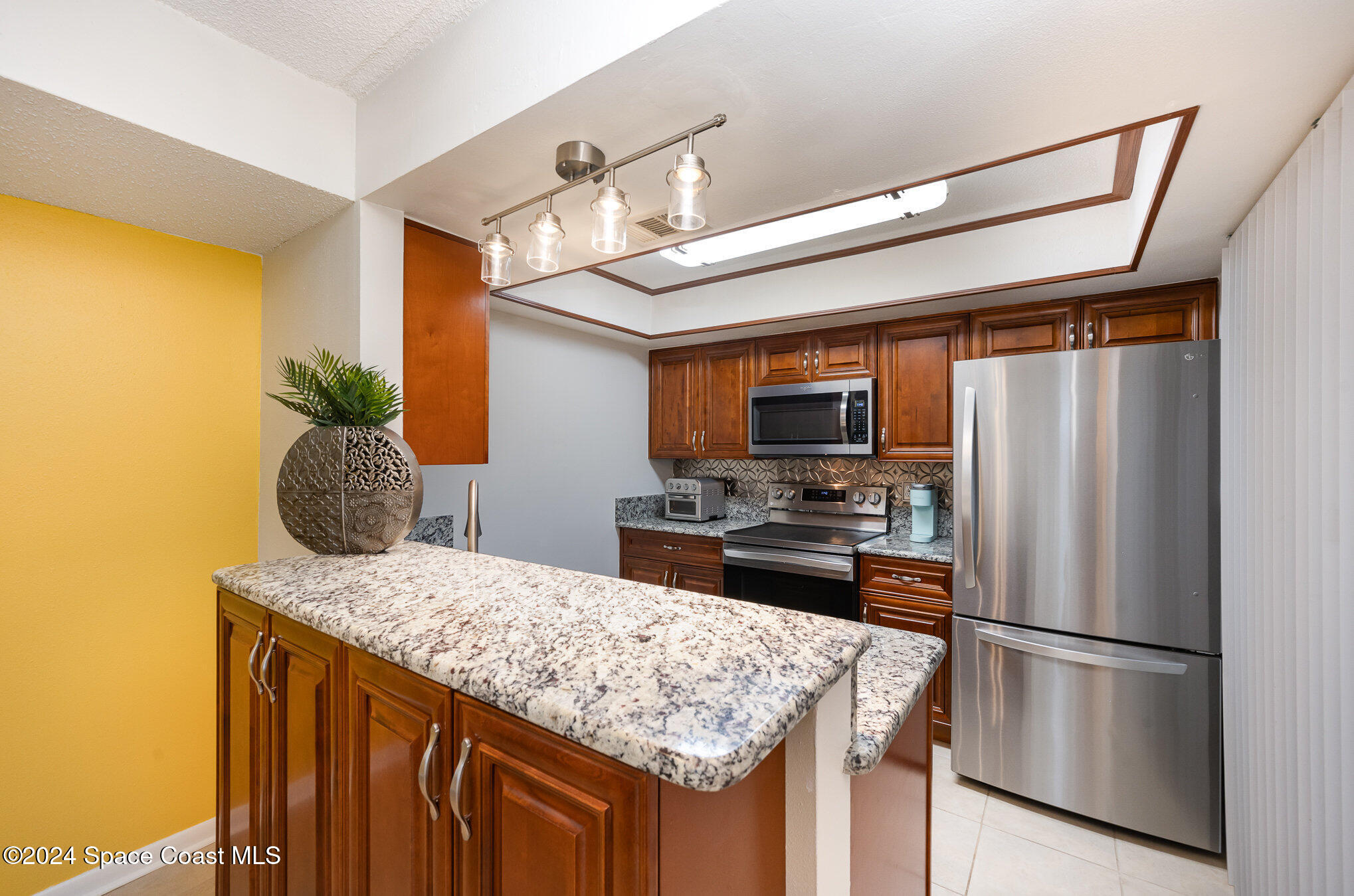 641 Ridge Club Drive, Unit 21 Melbourne, FL 32934 - Photo 10 of 23 Breakfast Bar
