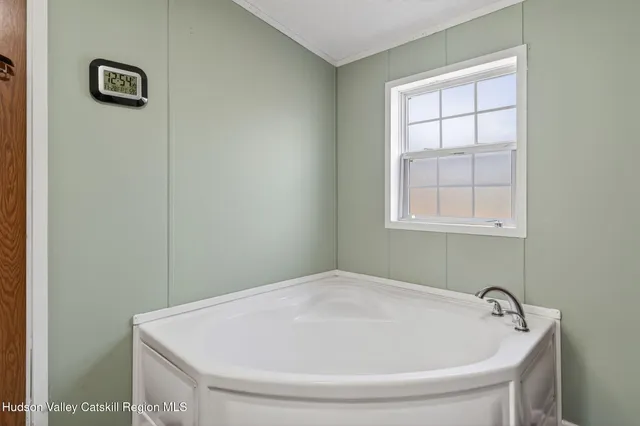 a bathroom with a bathtub