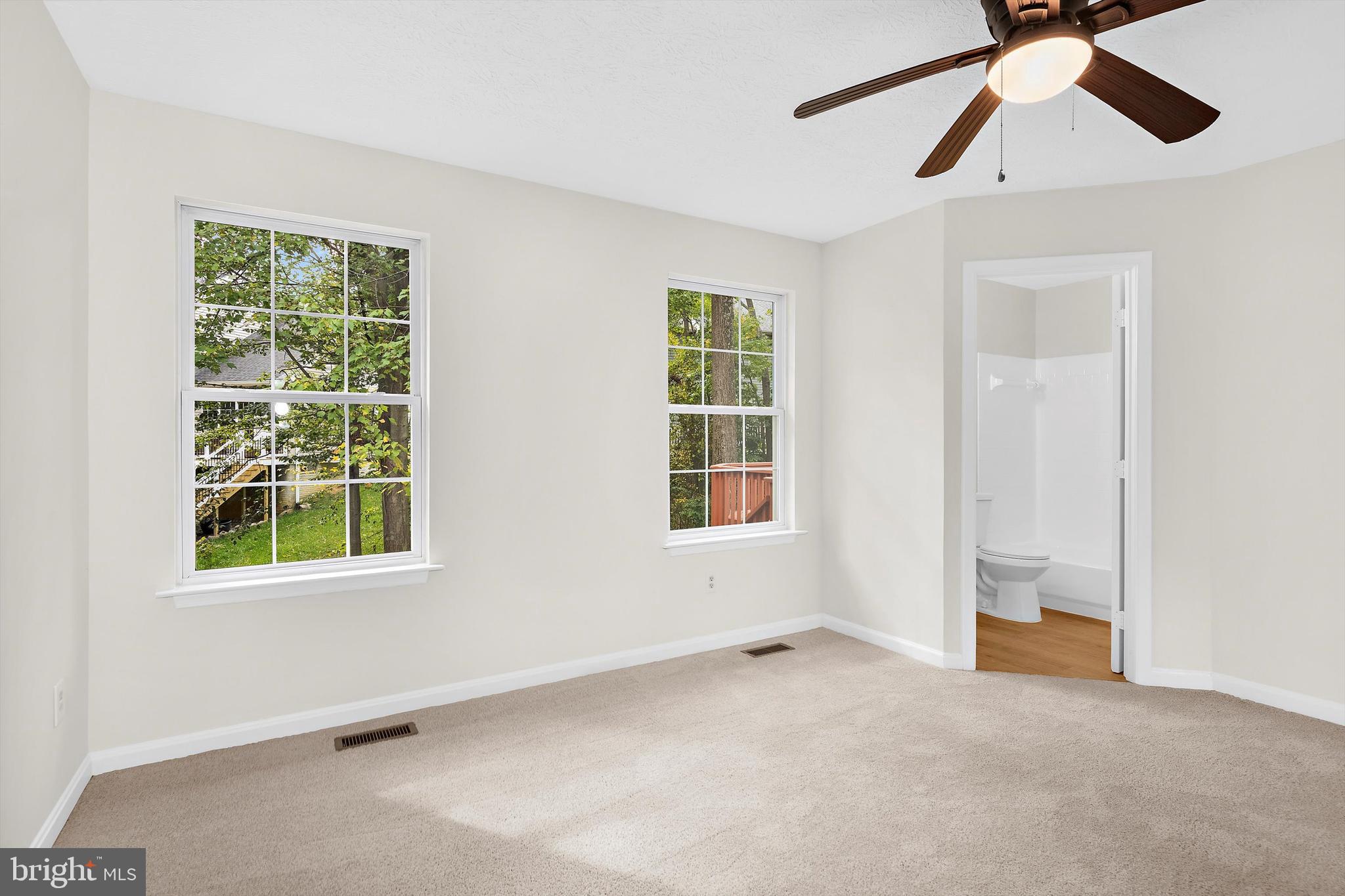 2335 Golden Chapel Road Odenton, MD 21113 - Photo 15 of 37 an empty room with windows and closet