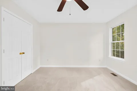 a view of an empty room with window