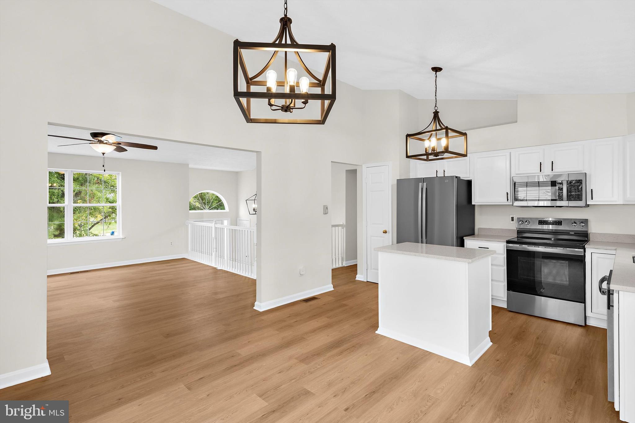 2335 Golden Chapel Road Odenton, MD 21113 - Photo 8 of 37 a view of a kitchen with a sink dishwasher and a microwave oven