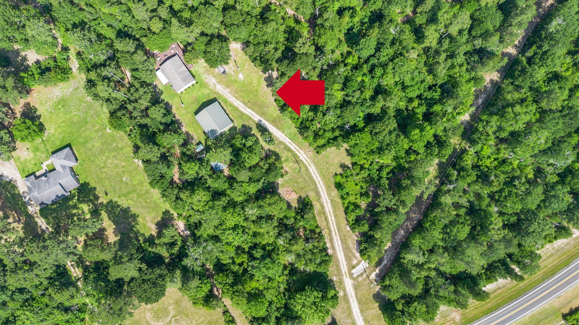 50 Fm 3179 Road Huntsville, TX 77320 - Photo 43 of 45 From above, you can truly appreciate the space, layout, and versatility this property has to offer.