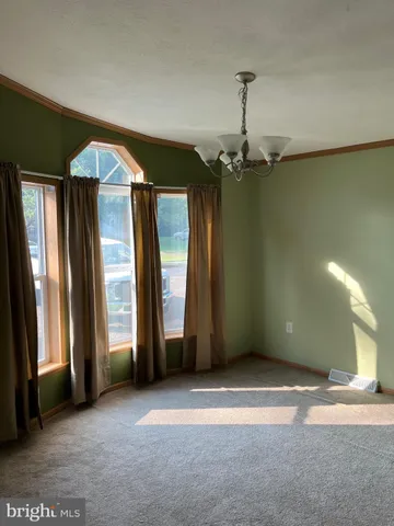 a view of entryway with a front door