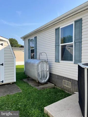a view of a backyard with a garden