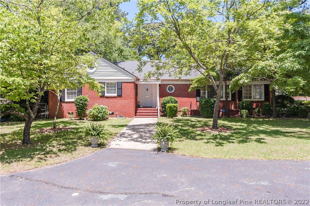 1904 Morganton Road Fayetteville, NC 28305 - Photo 1 of 45 a front view of house with yard and green space