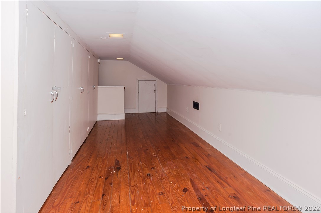 1904 Morganton Road Fayetteville, NC 28305 - Photo 18 of 45 a view of a hallway with wooden floor