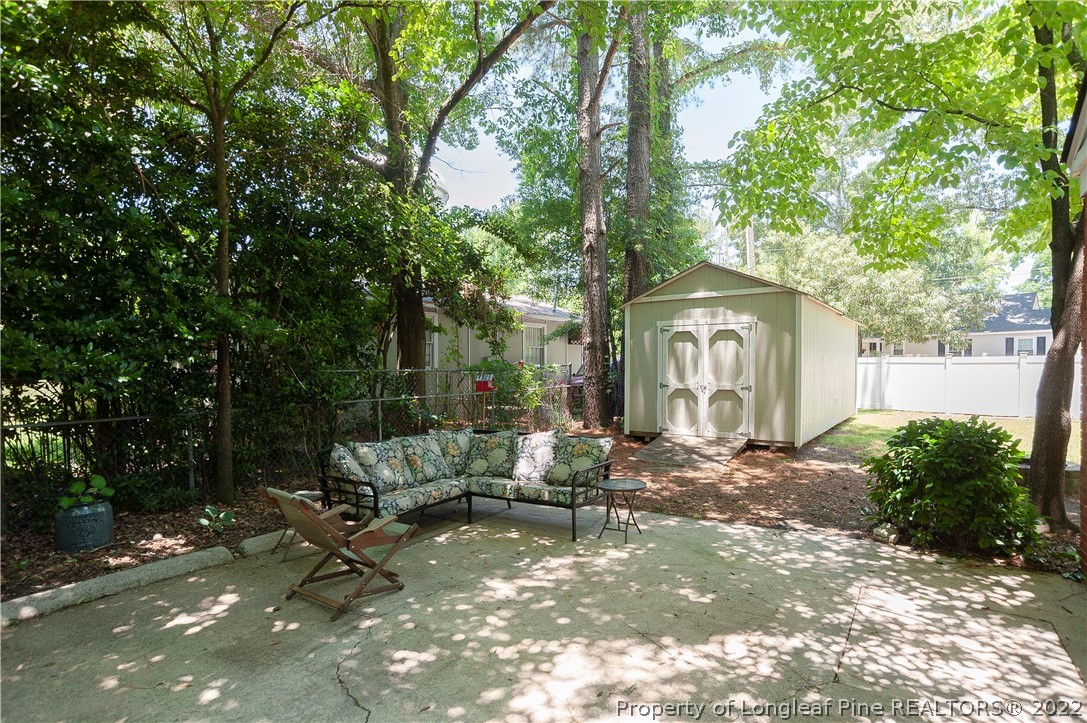 1904 Morganton Road Fayetteville, NC 28305 - Photo 7 of 45 a view of a house with backyard and sitting area