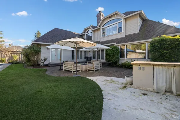 a spacious bedroom with a bed and a window