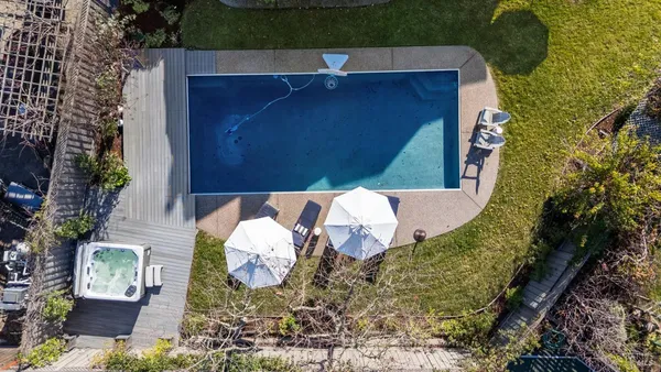 a bathroom with a bathtub and shower