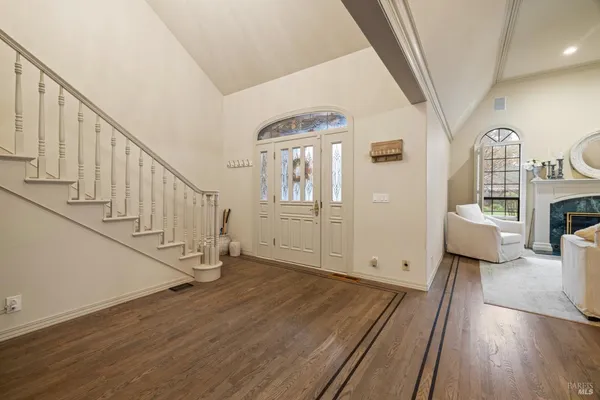 a spacious bathroom with a double vanity sink mirror and a bathtub