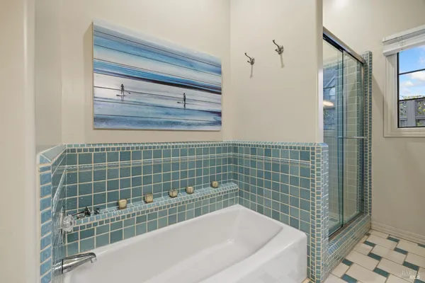 a kitchen with a stove a sink and a refrigerator