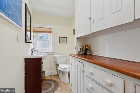a bathroom with a sink and a toilet
