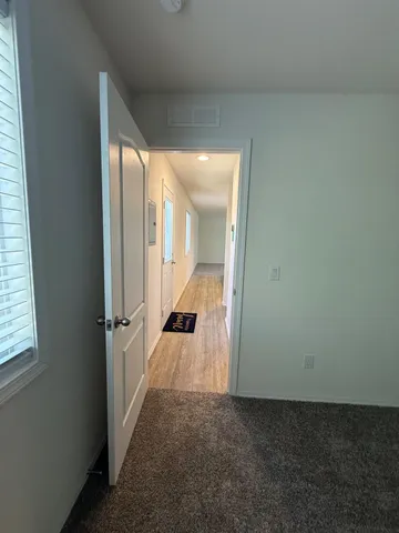 a view of a room with a window