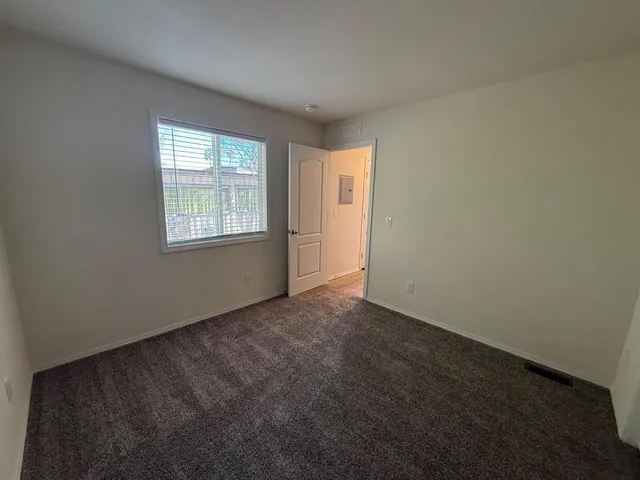 a view of a house with a snow on the road
