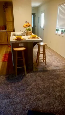 a view of a room with table and chair