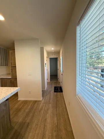 a view of a street with a building in the background