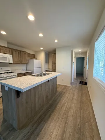 a view of a back yard of the house