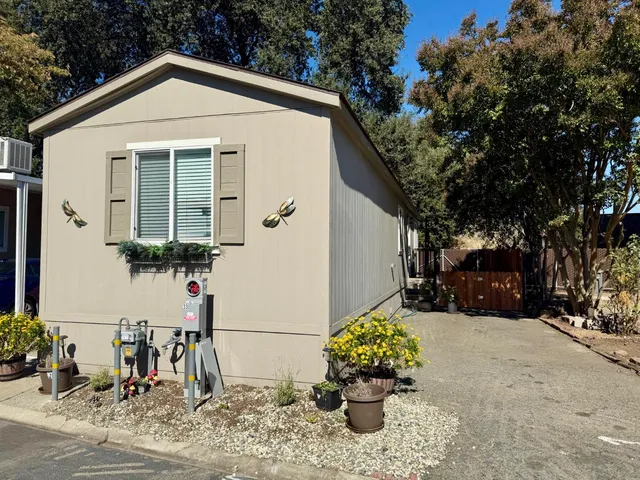 a view of a street with a building in the background