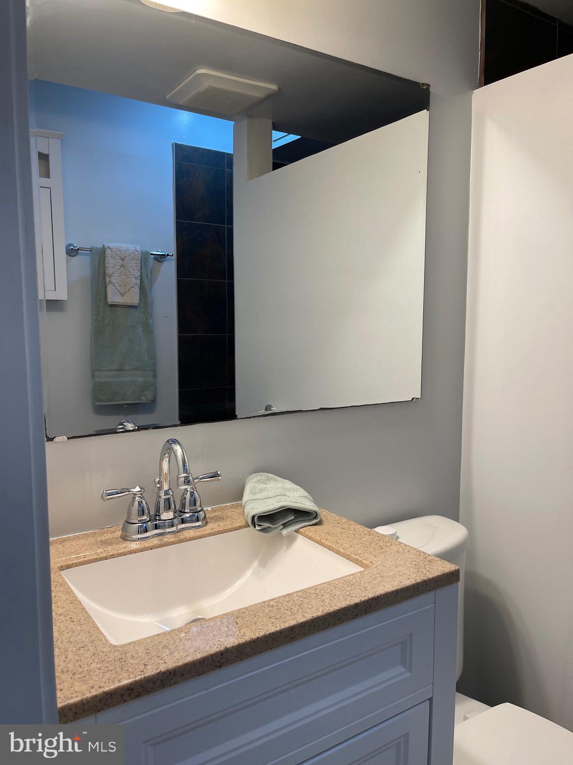 108 G Street Southwest, Unit 105 Washington, DC 20024 - Photo 29 of 52 a bathroom with a sink and a mirror