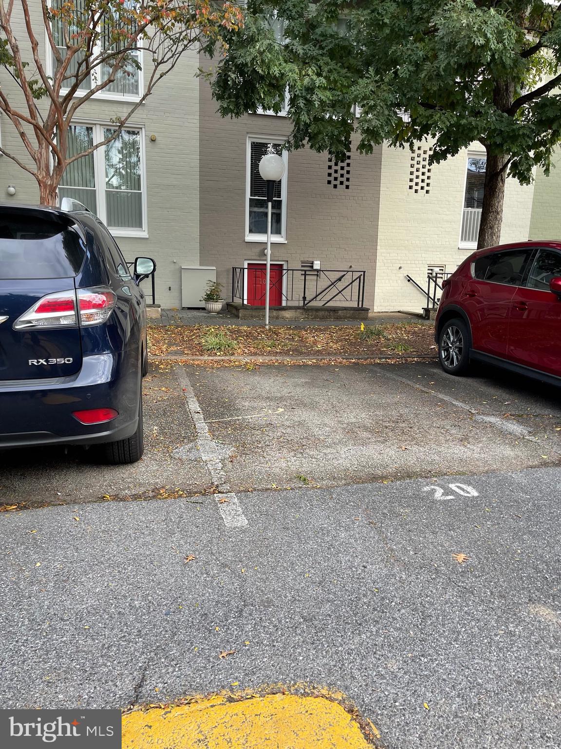 108 G Street Southwest, Unit 105 Washington, DC 20024 - Photo 38 of 52 a view of a backyard with a car parked in it