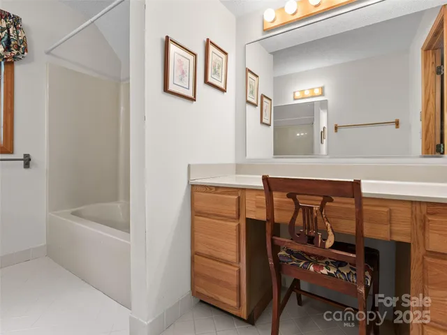 a bathroom with a bathtub and a sink