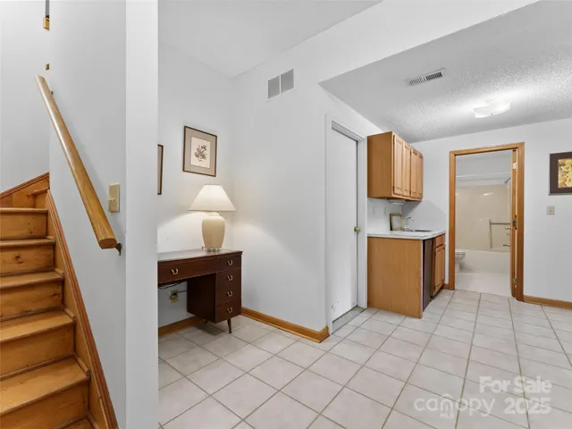 a view of a storage & utility room with wooden floor