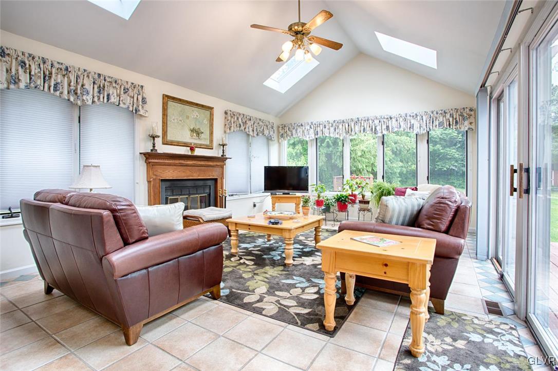 799 Hunter Road Easton, PA 18040 - Photo 15 of 35 Spectacular family room with fireplace, tiled floo