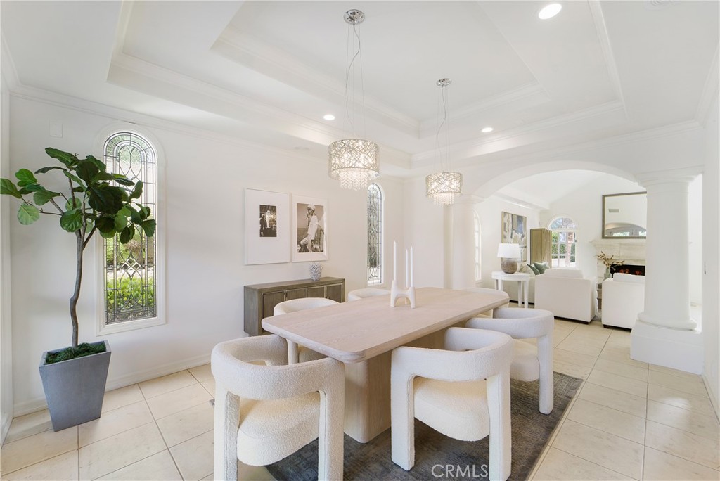 82 Ritz Cove Drive Dana Point, CA 92629 - Photo 11 of 48 a living room with furniture and a potted plant