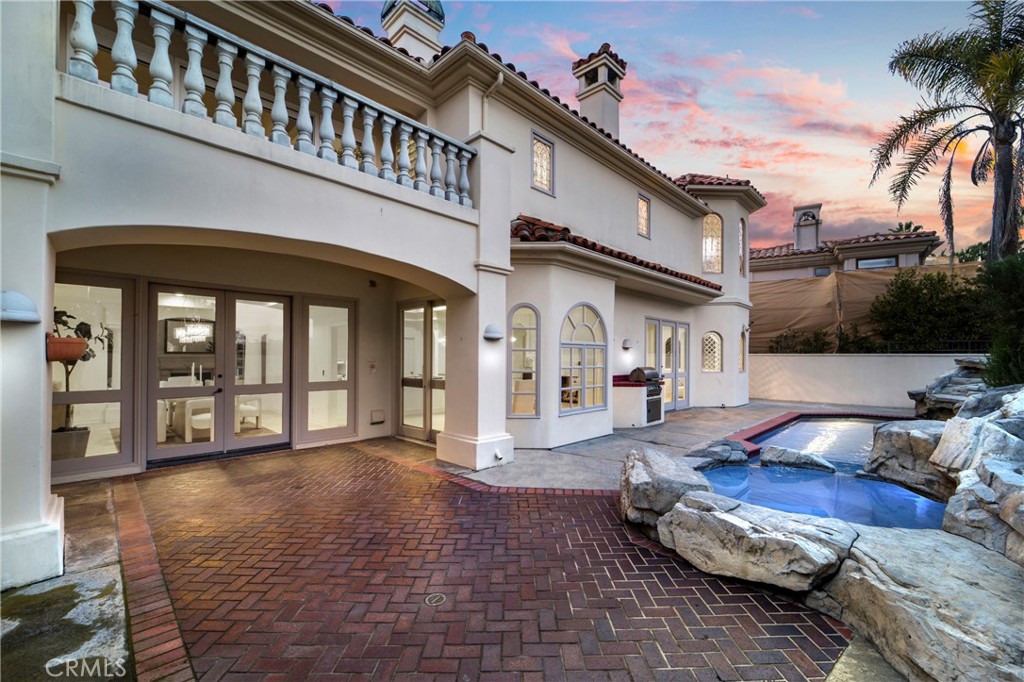 82 Ritz Cove Drive Dana Point, CA 92629 - Photo 24 of 48 a view of a house with backyard and porch