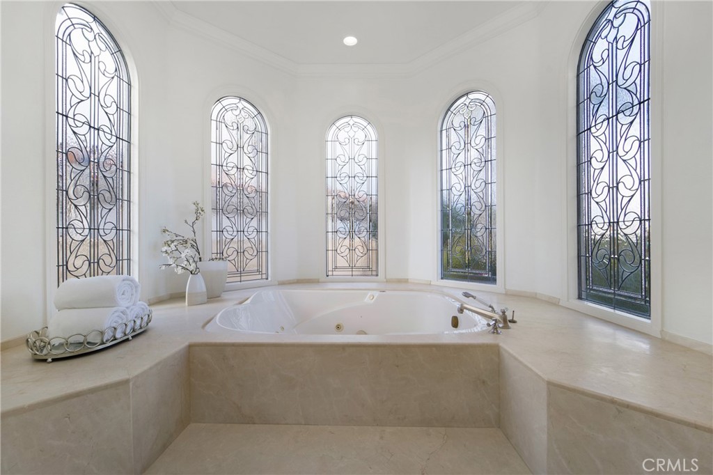 82 Ritz Cove Drive Dana Point, CA 92629 - Photo 30 of 48 a spacious bathroom with windows bathtub and shower