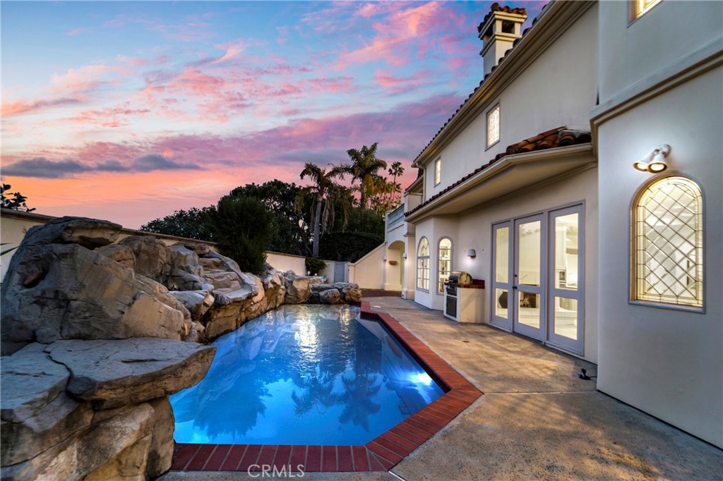 82 Ritz Cove Drive Dana Point, CA 92629 - Photo 46 of 48 a view of a house with swimming pool and sitting area