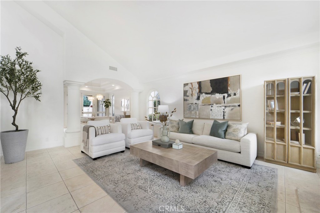 82 Ritz Cove Drive Dana Point, CA 92629 - Photo 9 of 48 a living room with furniture and a potted plant