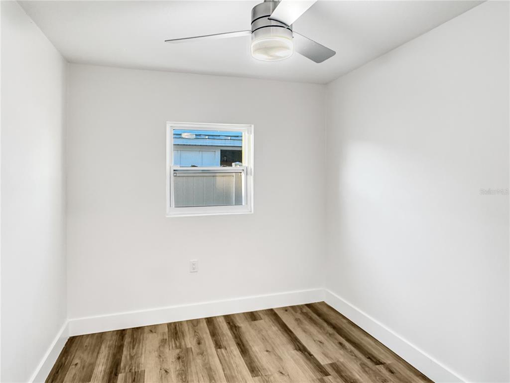 13739 Coco Avenue Hudson, FL 34667 - Photo 16 of 25 an empty room with a window